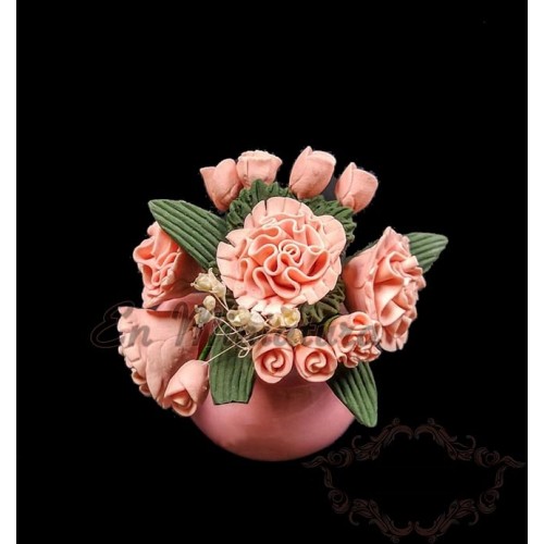 Vase of pink flowers