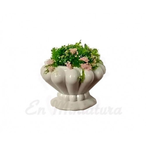 White planter with flowers