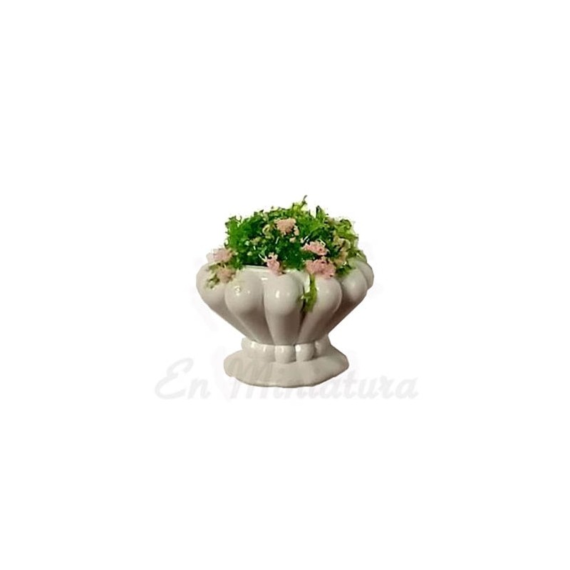 White planter with flowers
