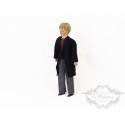 Doll with black coat