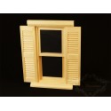 Window with unpainted wood shutter