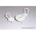 Mesa de mármol blanca con sillas