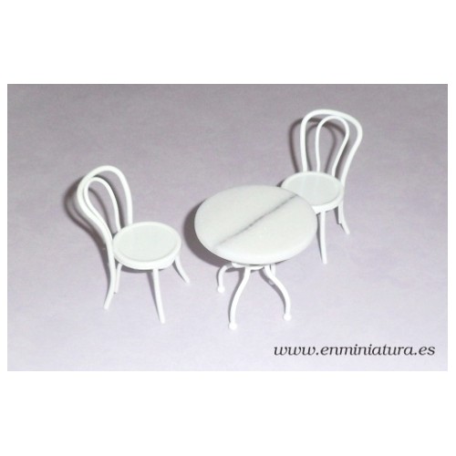 Mesa de mármol blanca con sillas